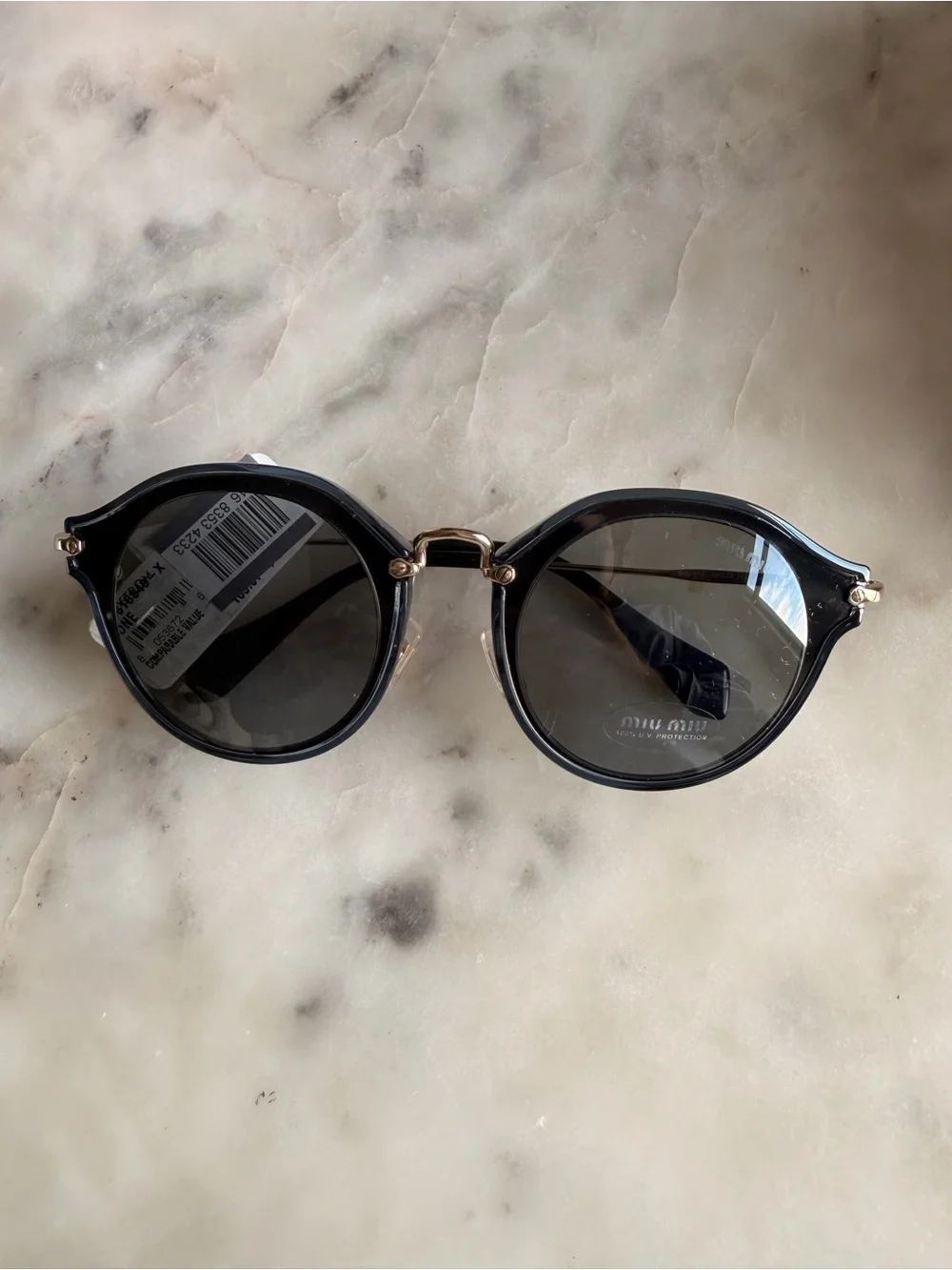 Miu Miu Round Sunglasses